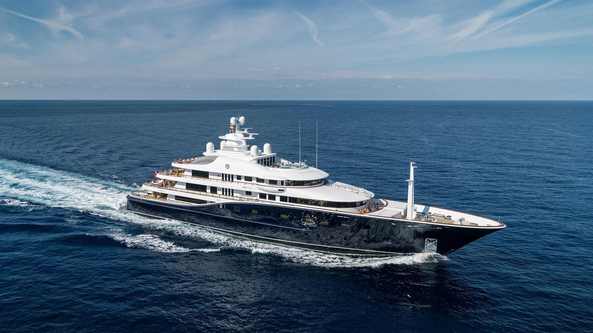a large ship in the water aboard AQUILA Yacht for Sale
