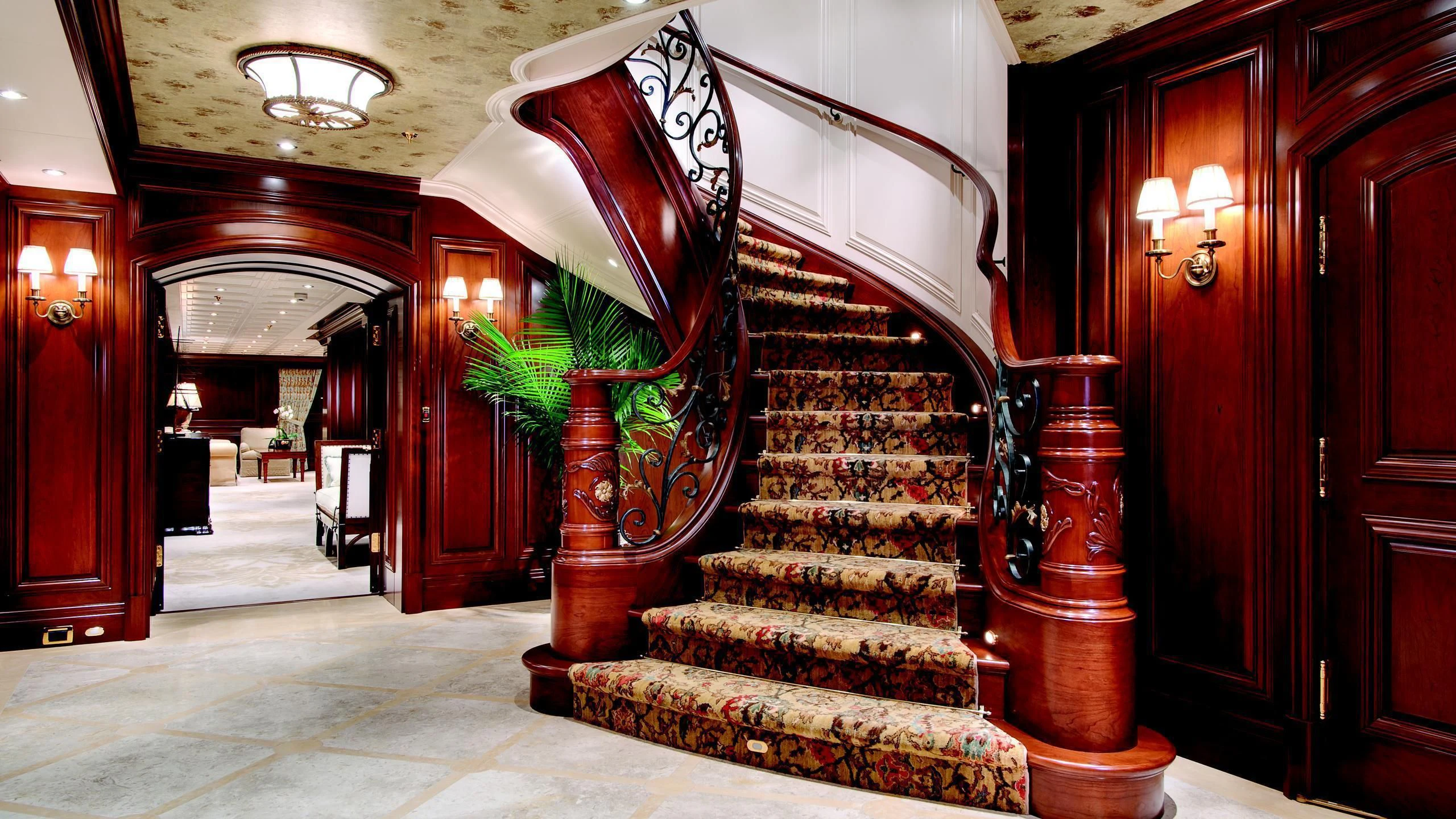 a staircase in a house aboard AQUILA Yacht for Sale