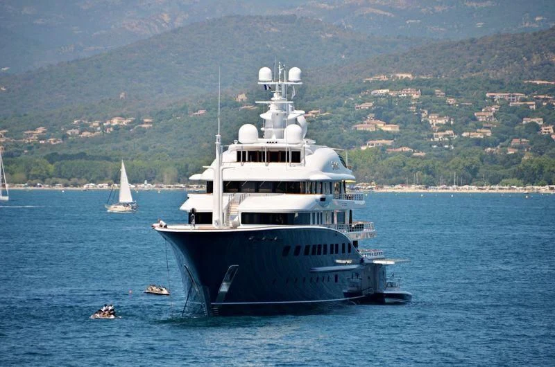 a large boat in the water aboard AQUILA Yacht for Sale