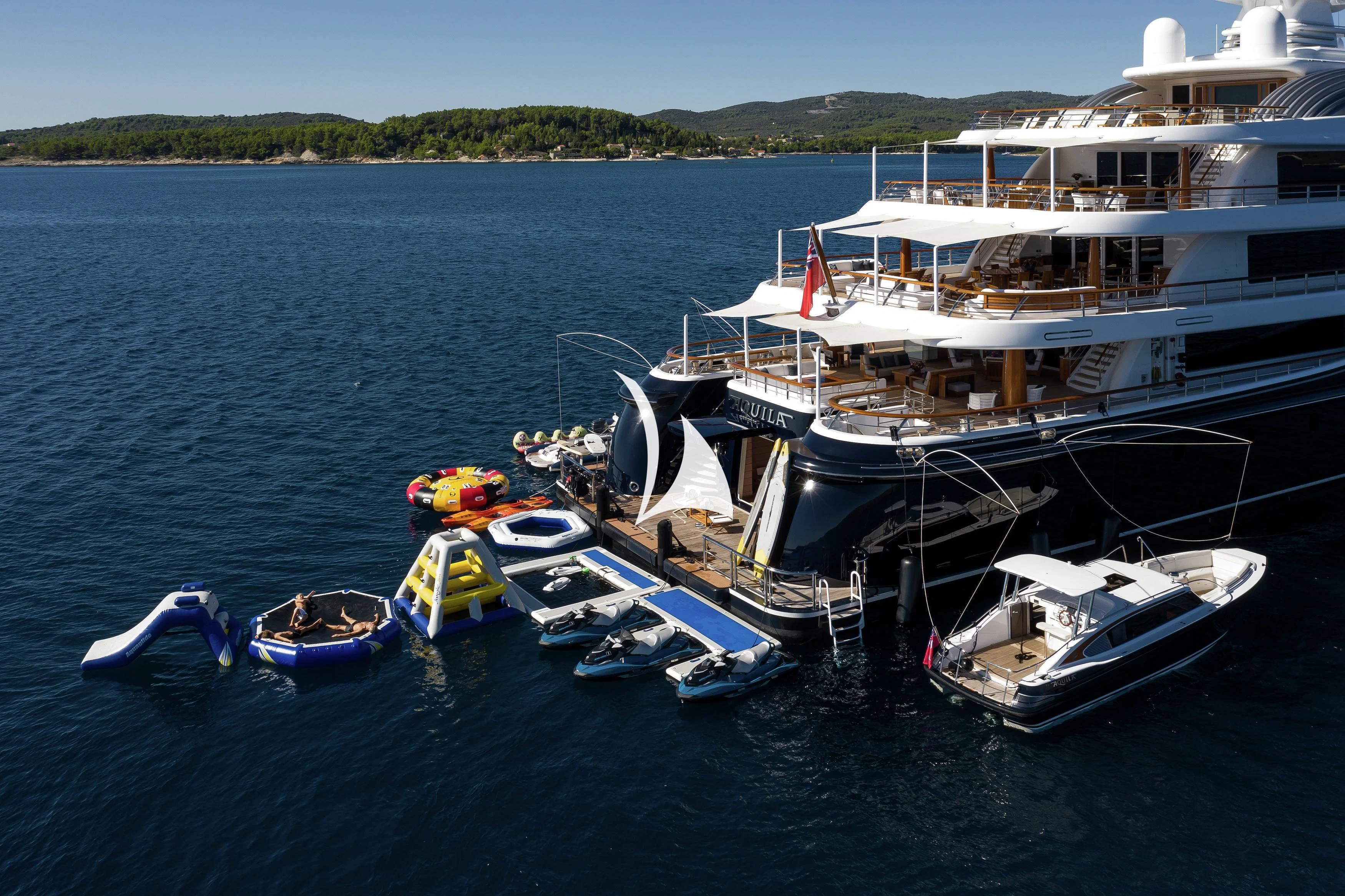 boats on the water aboard AQUILA Yacht for Sale