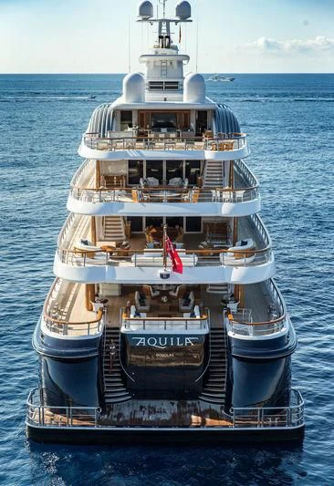 a large ship in the water aboard AQUILA Yacht for Sale