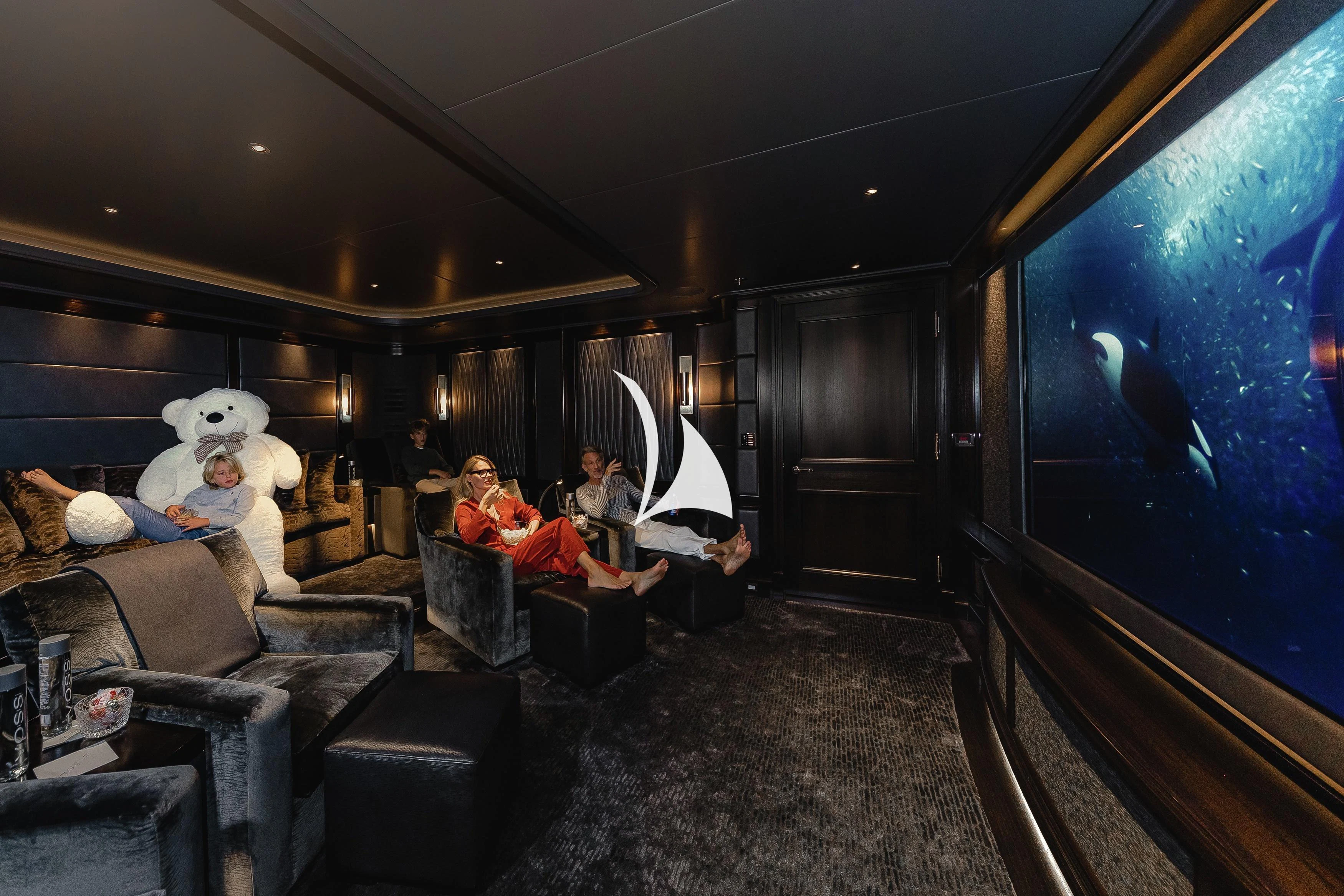 people sitting in a train aboard AQUILA Yacht for Sale