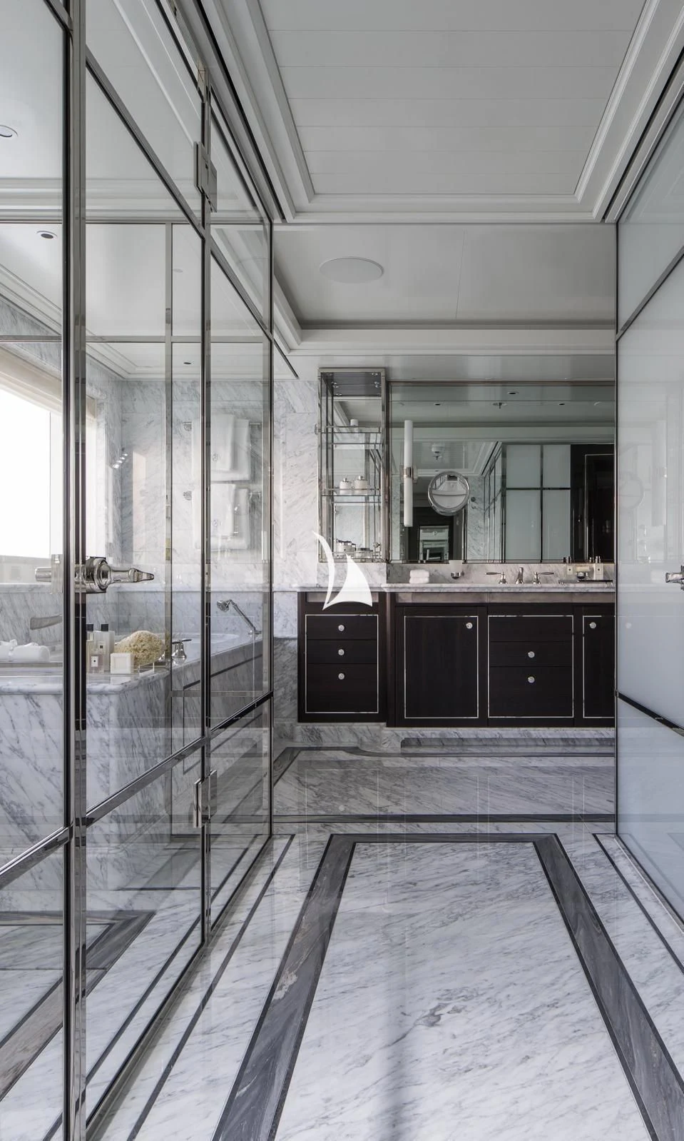 a large bathroom with glass walls aboard AQUILA Yacht for Sale