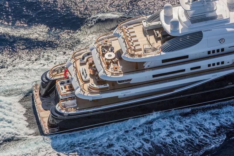 a military vehicle on a rocky surface aboard AQUILA Yacht for Sale