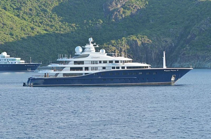 a couple of boats on the water aboard AQUILA Yacht for Sale