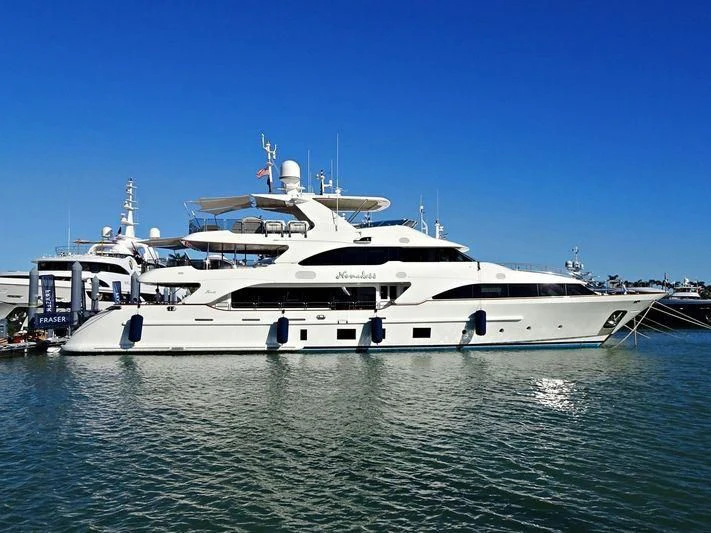 a large white boat in the water aboard NAMASTE Yacht for Sale