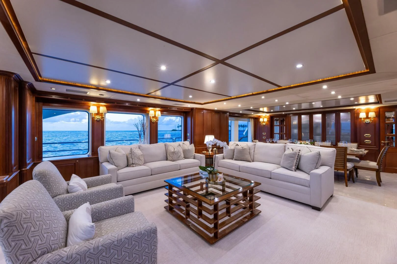 a living room with a large window aboard NAMASTE Yacht for Sale