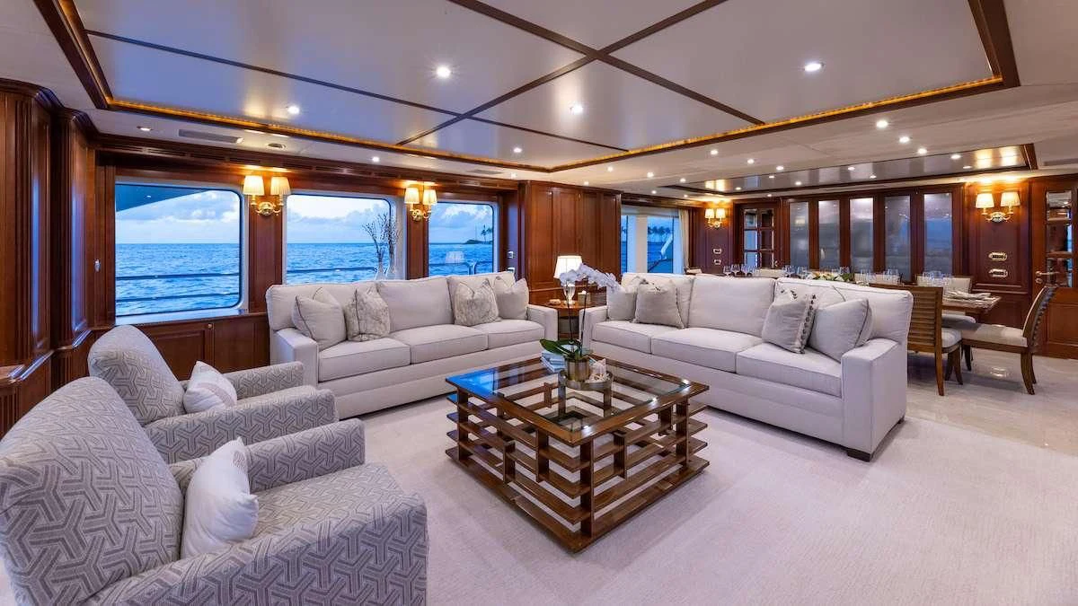 a living room with a large window aboard NAMASTE Yacht for Sale