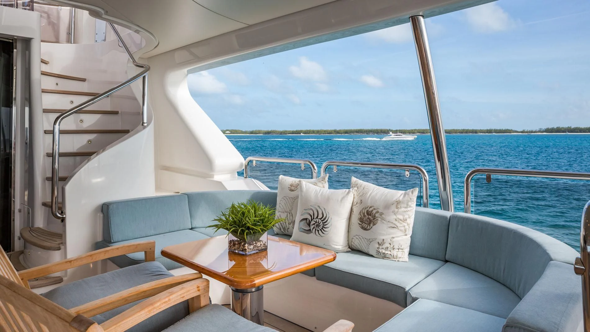 a room with a table and chairs aboard NAMASTE Yacht for Sale