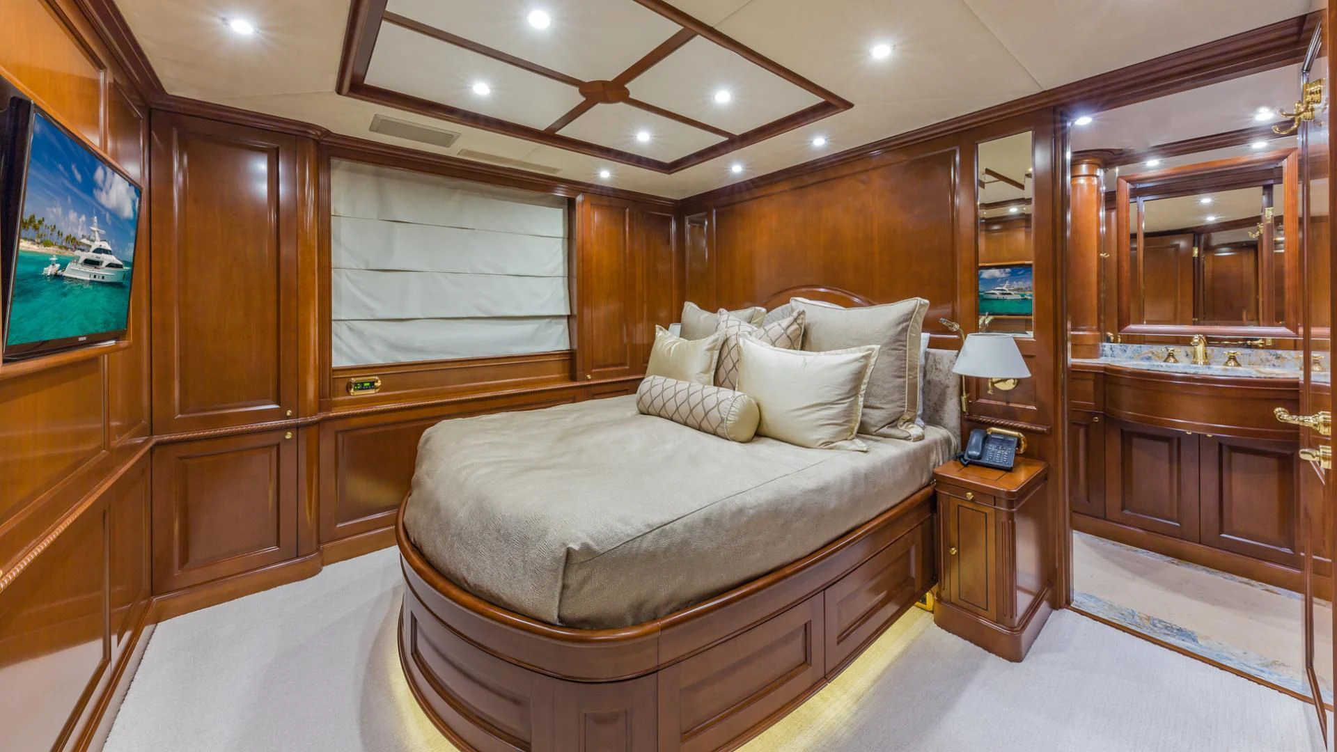 a bed in a room aboard NAMASTE Yacht for Sale