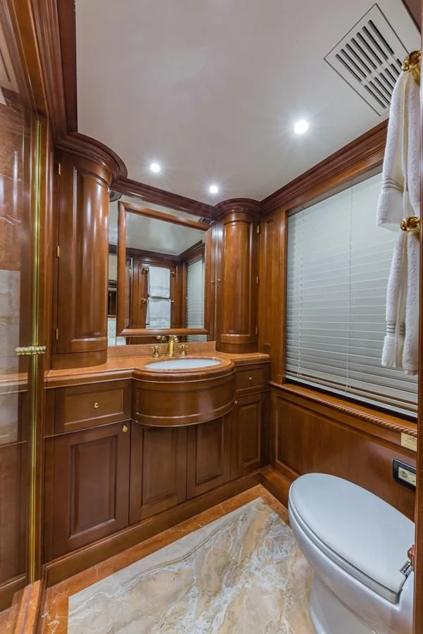a bathroom with a sink and a toilet aboard NAMASTE Yacht for Sale