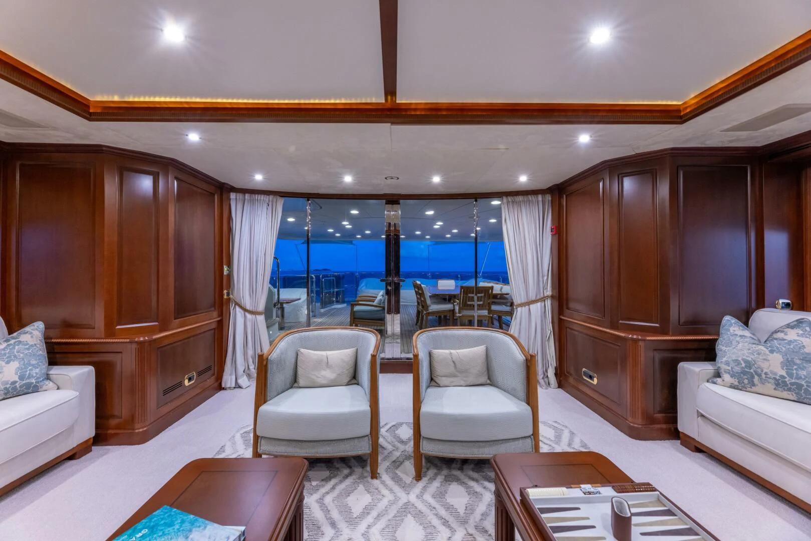 a living room with a large window aboard NAMASTE Yacht for Sale