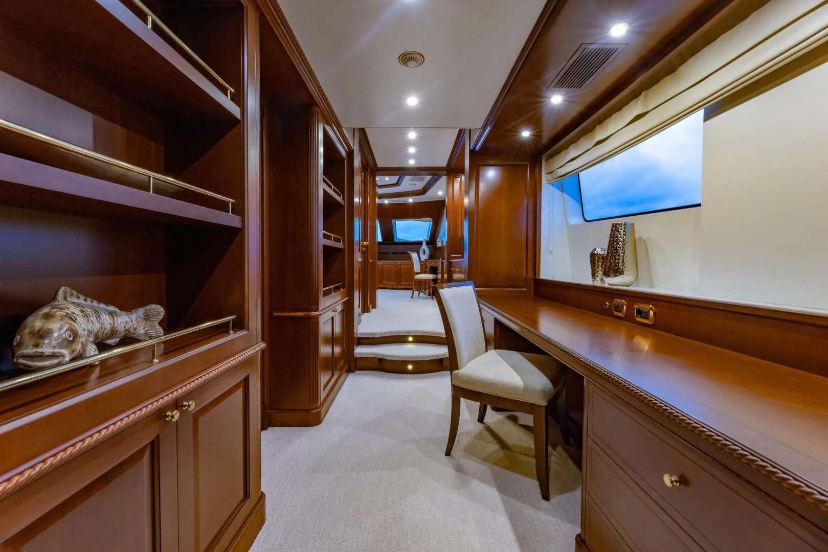a large room with a large mirror aboard NAMASTE Yacht for Sale