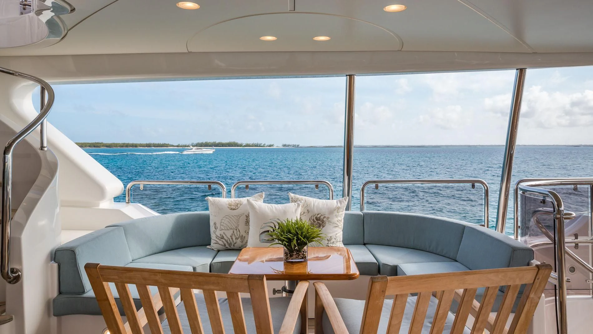 a room with a table and chairs aboard NAMASTE Yacht for Sale