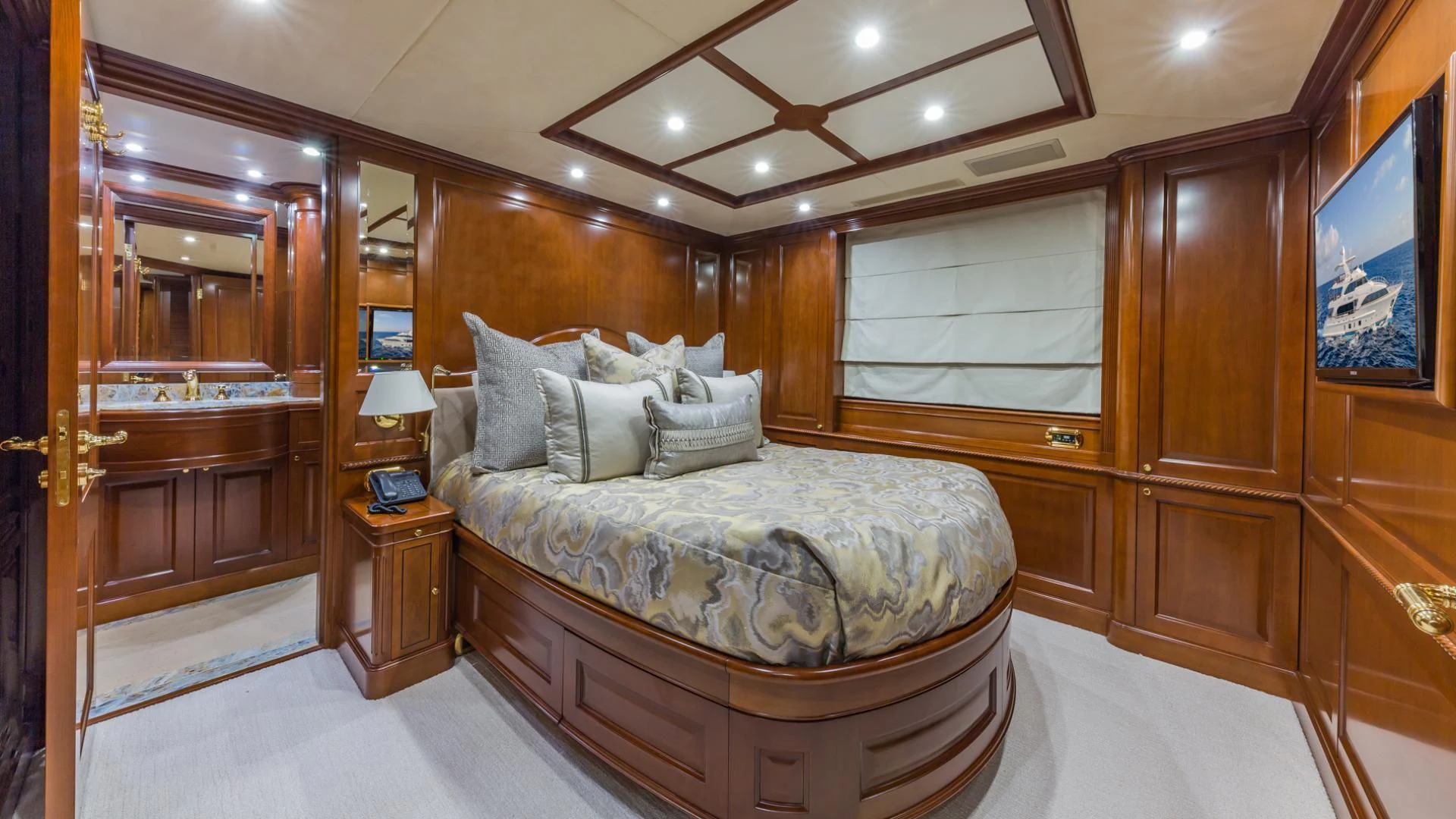 a bed in a room aboard NAMASTE Yacht for Sale