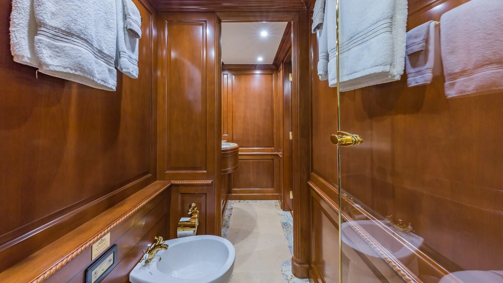 a bathroom with a sink and a shower aboard NAMASTE Yacht for Sale