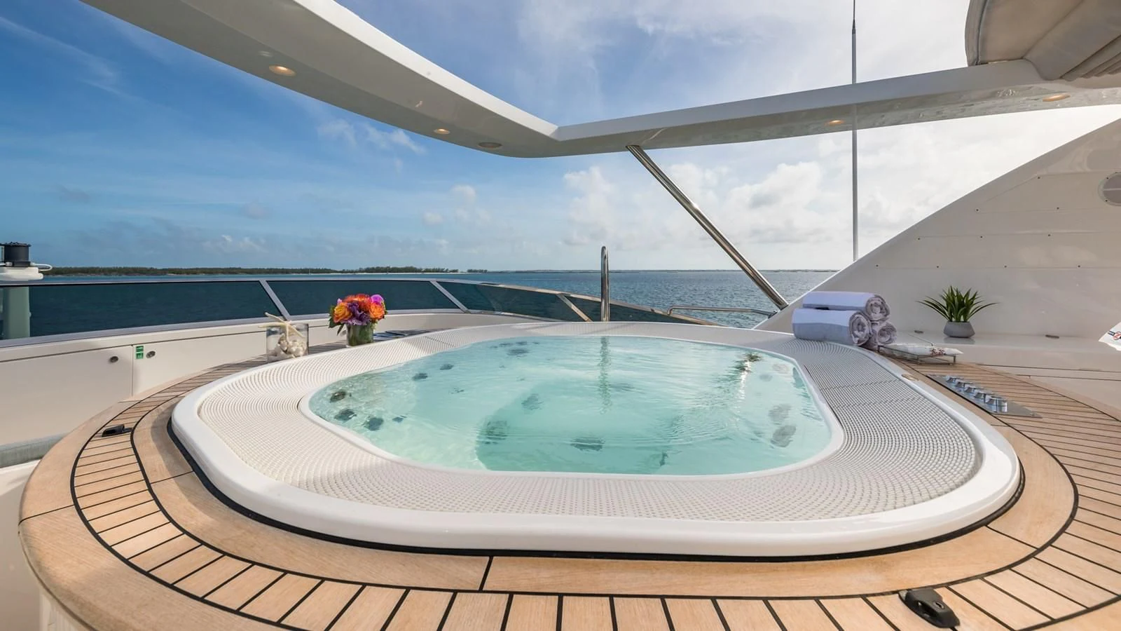 a swimming pool on a deck aboard NAMASTE Yacht for Sale