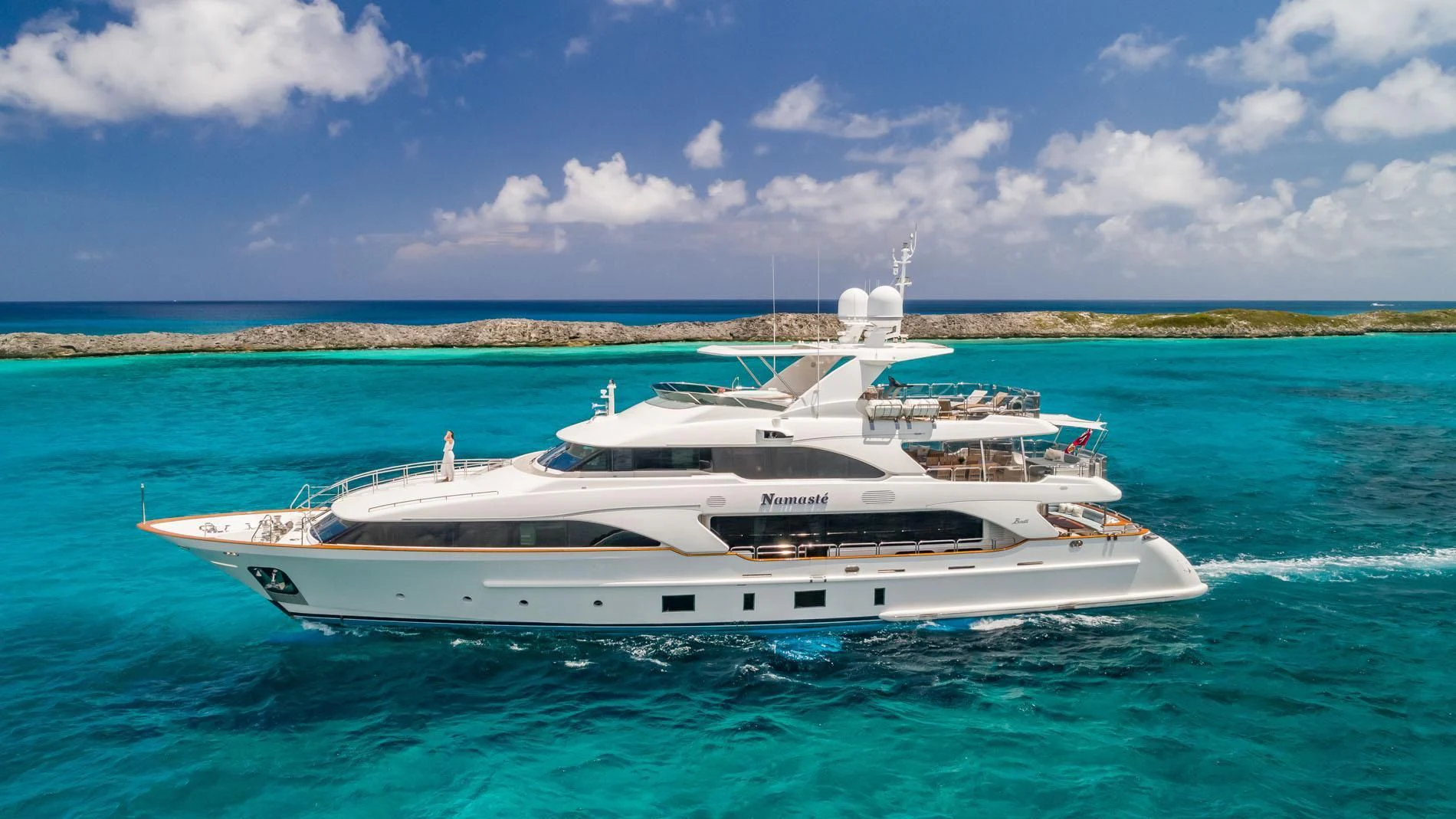 a white yacht in the water aboard NAMASTE Yacht for Sale