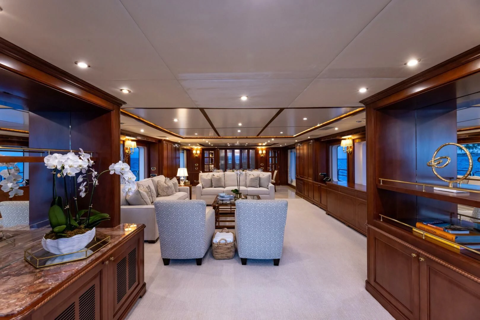 a living room with a large mirror aboard NAMASTE Yacht for Sale
