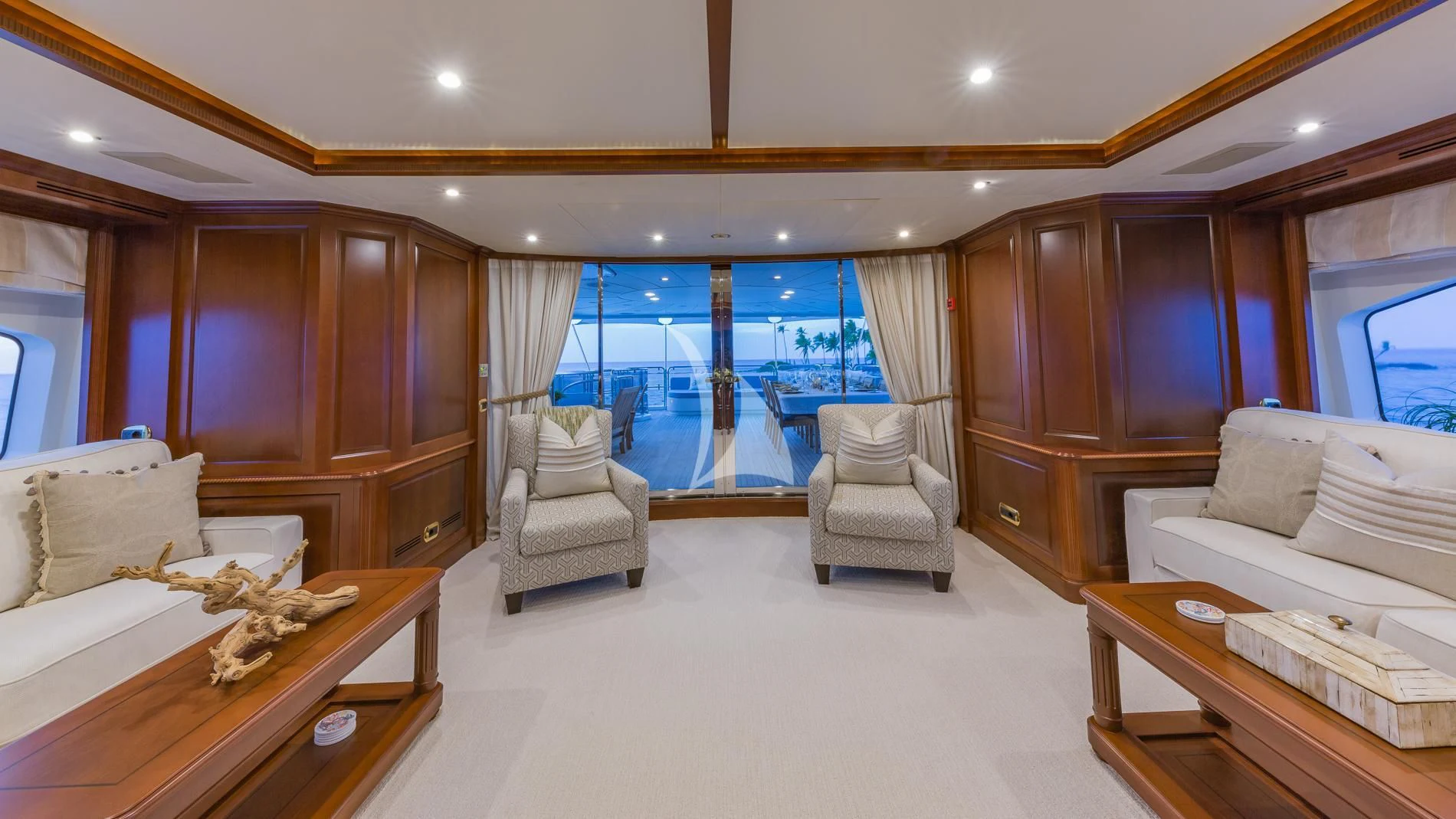 a living room with a large window aboard NAMASTE Yacht for Sale