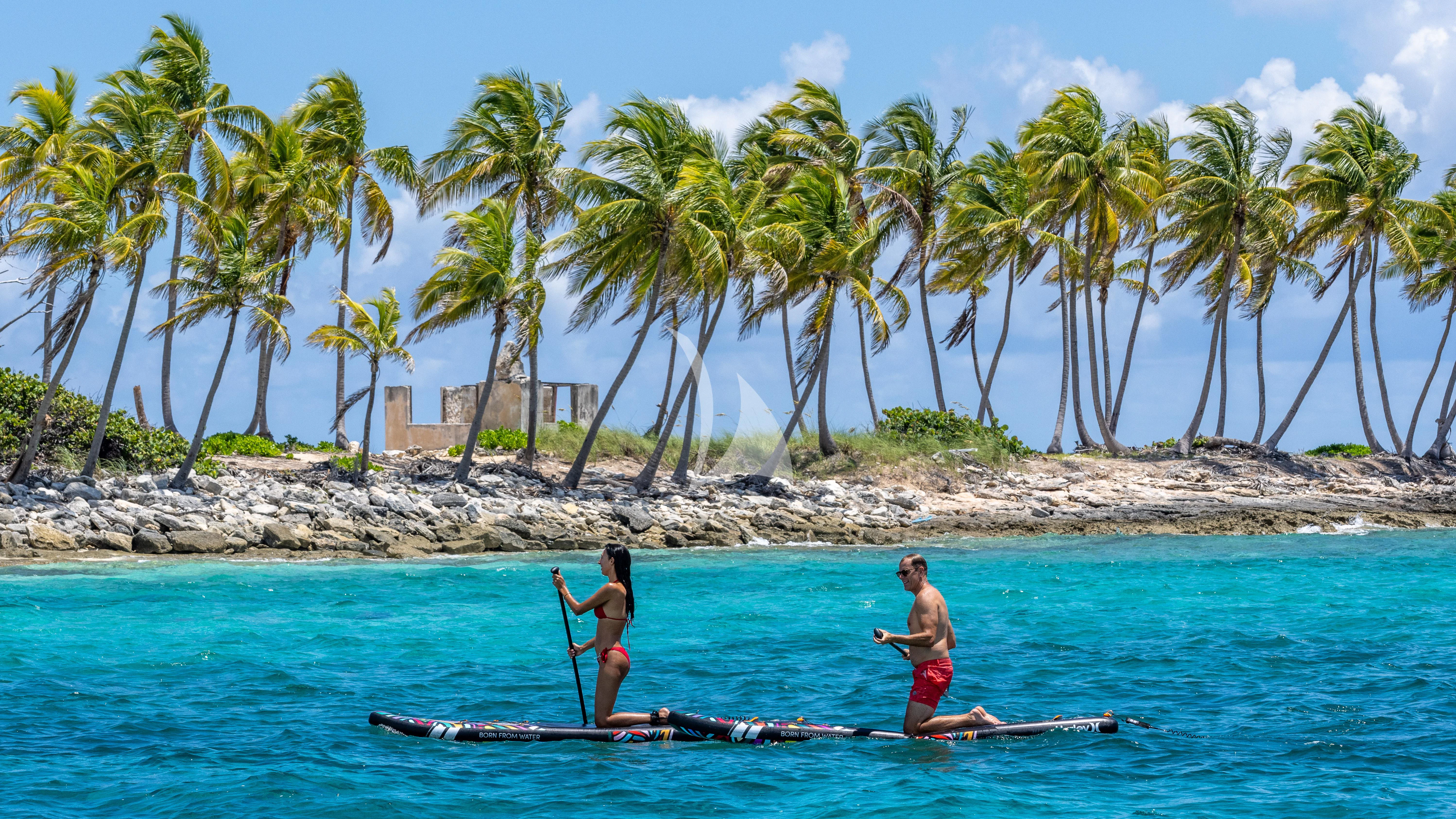 a couple of people in the water aboard NAMASTE Yacht for Sale