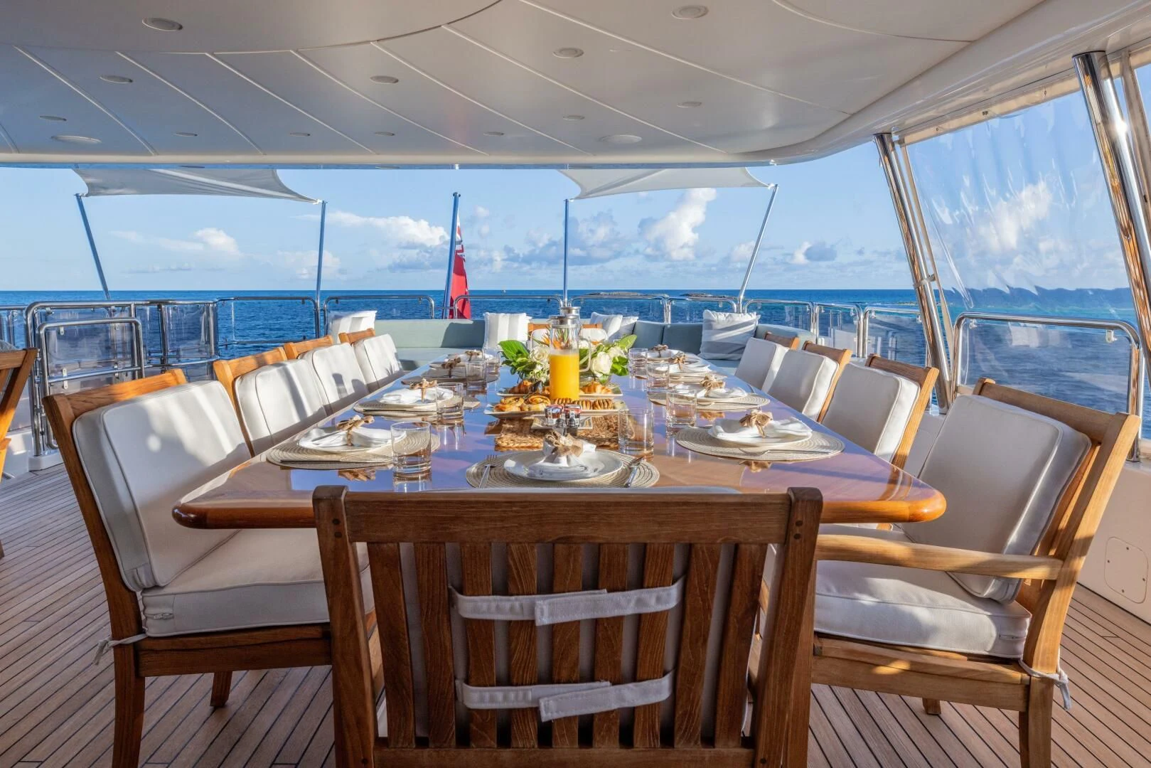 a dining table set for a meal aboard NAMASTE Yacht for Sale