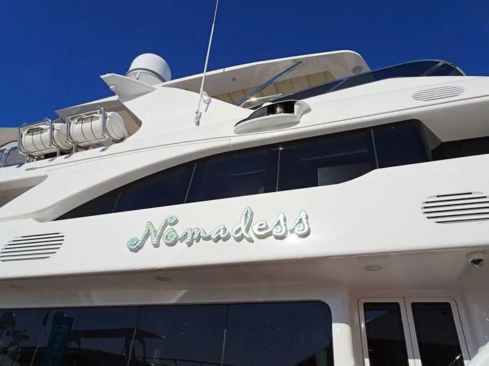 a white yacht with a blue sky aboard NAMASTE Yacht for Sale