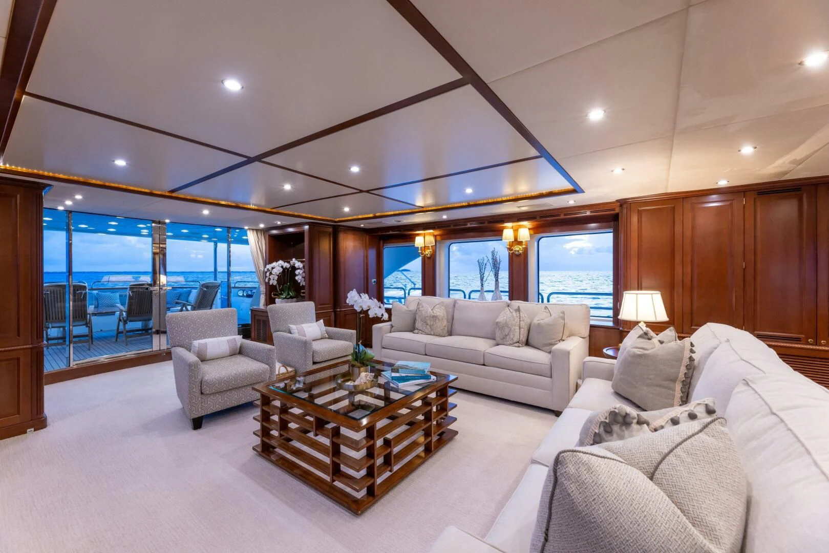 a living room with a large window aboard NAMASTE Yacht for Sale