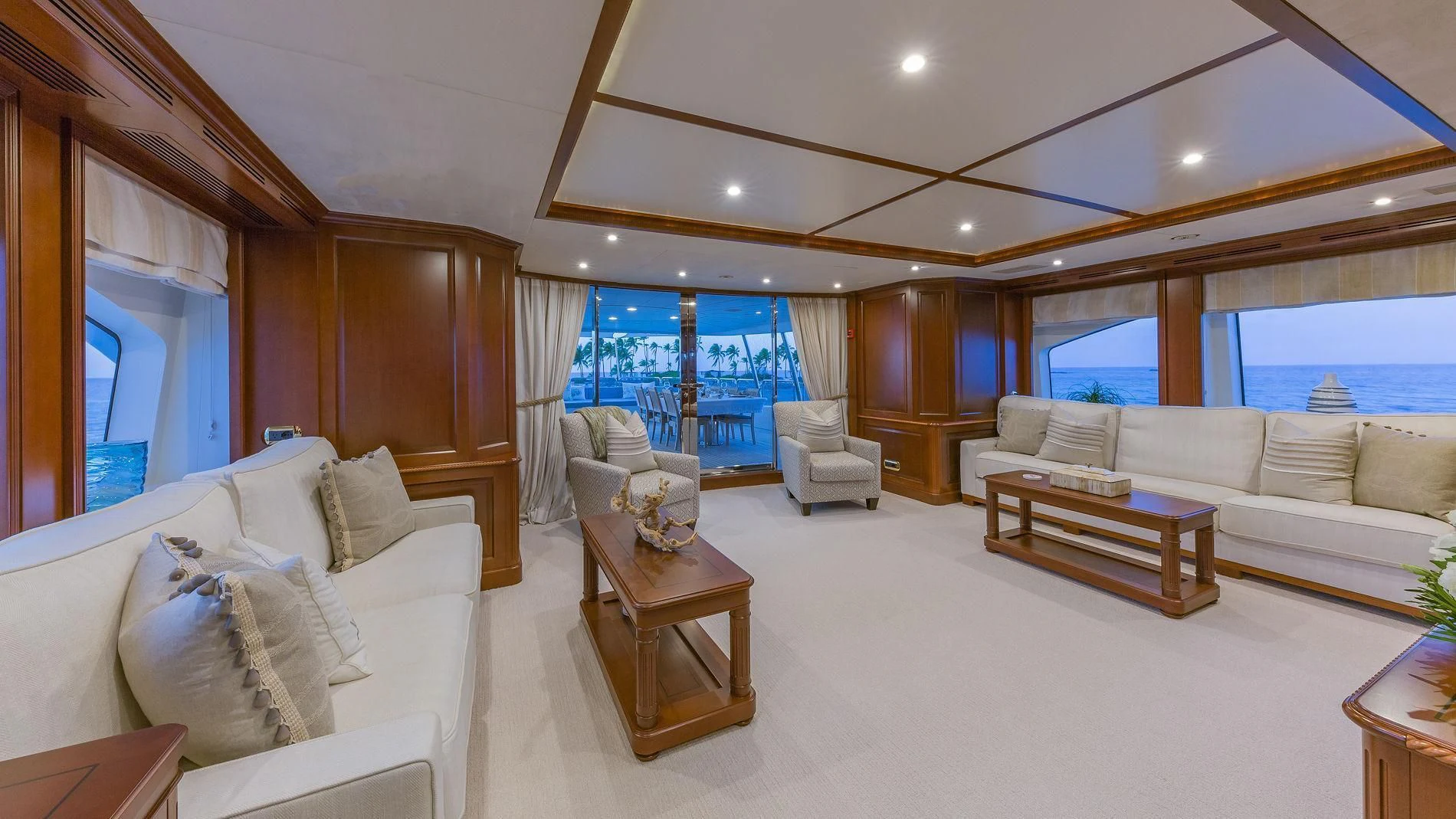 a living room with a large window aboard NAMASTE Yacht for Sale
