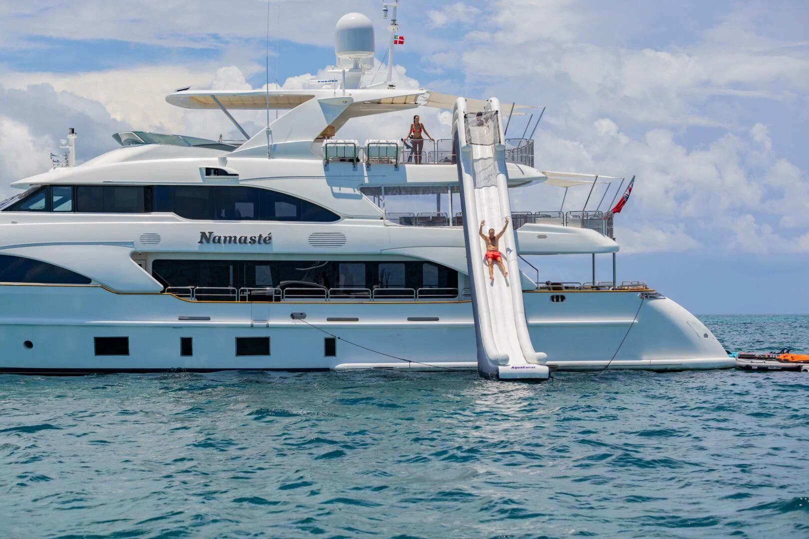 a white yacht in the water aboard NAMASTE Yacht for Sale