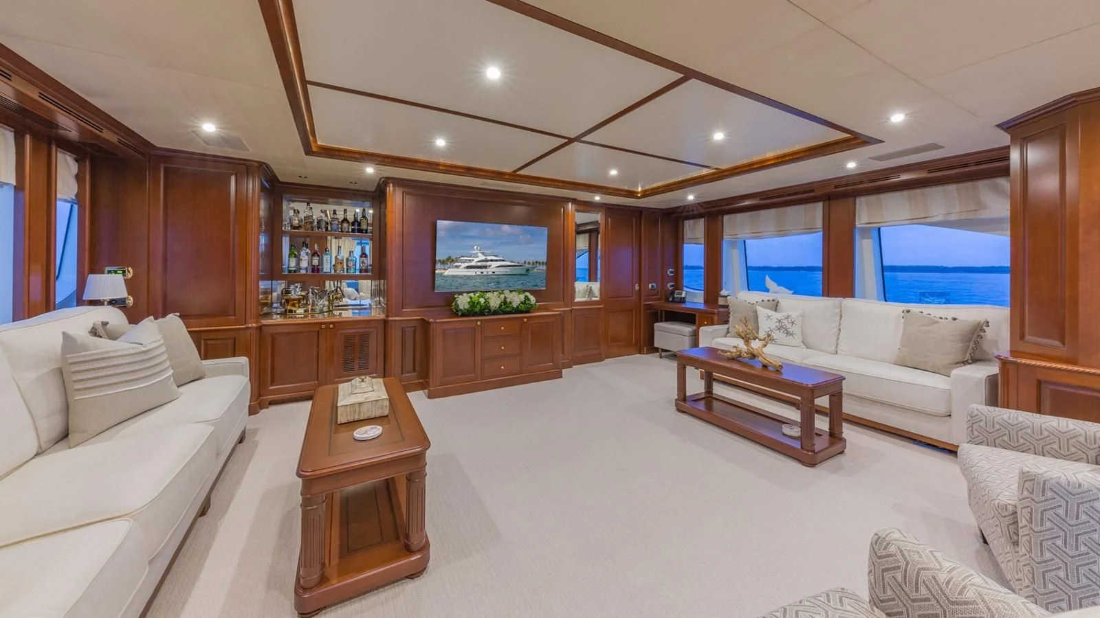 a living room with a large window aboard NAMASTE Yacht for Sale