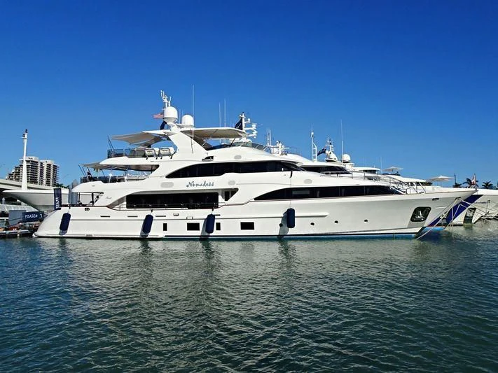 a large white yacht in the water aboard NAMASTE Yacht for Sale