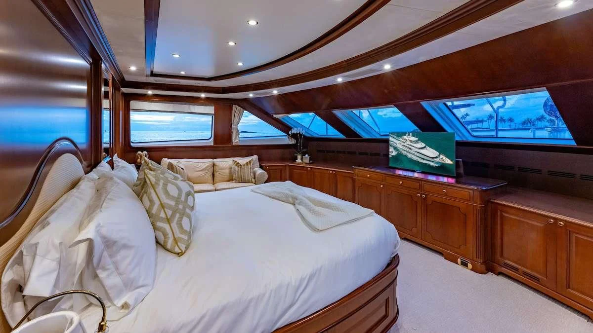 a bed with a large bed aboard NAMASTE Yacht for Sale