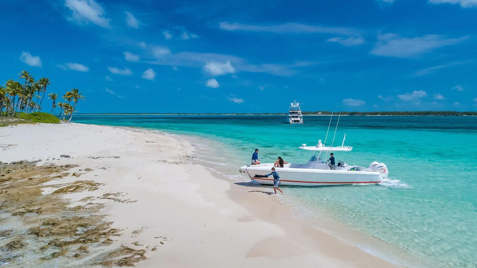 a boat on the beach aboard NAMASTE Yacht for Sale