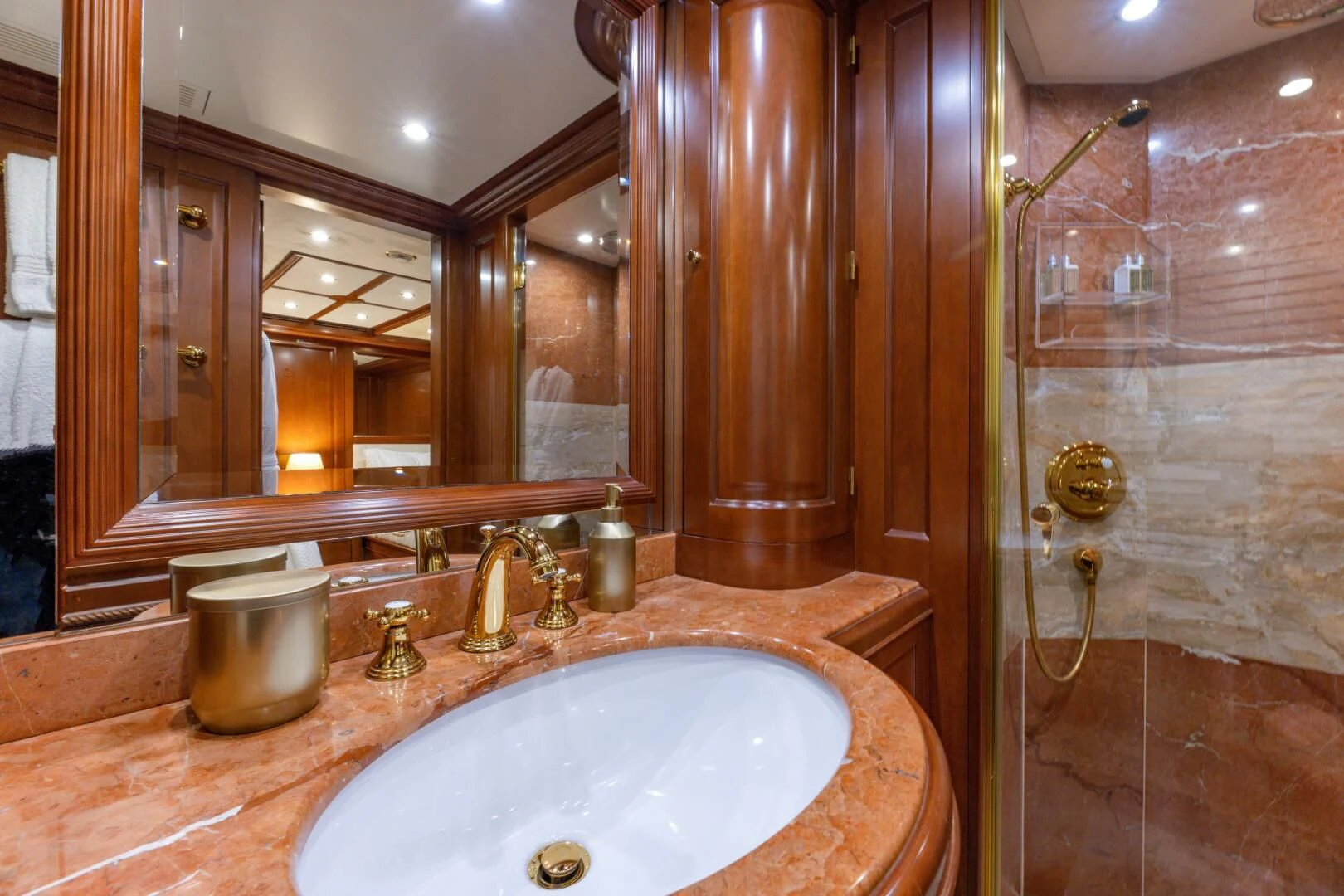 a bathroom with a sink and shower aboard NAMASTE Yacht for Sale