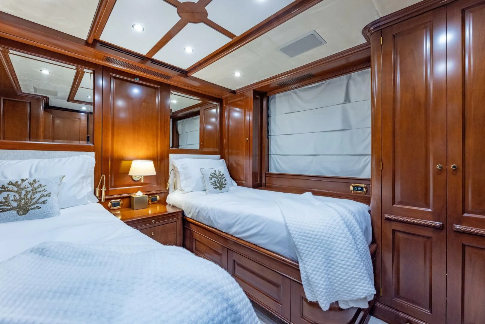 a couple of beds in a room aboard NAMASTE Yacht for Sale