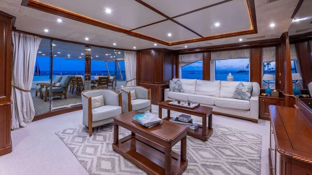 a living room with a large window aboard NAMASTE Yacht for Sale