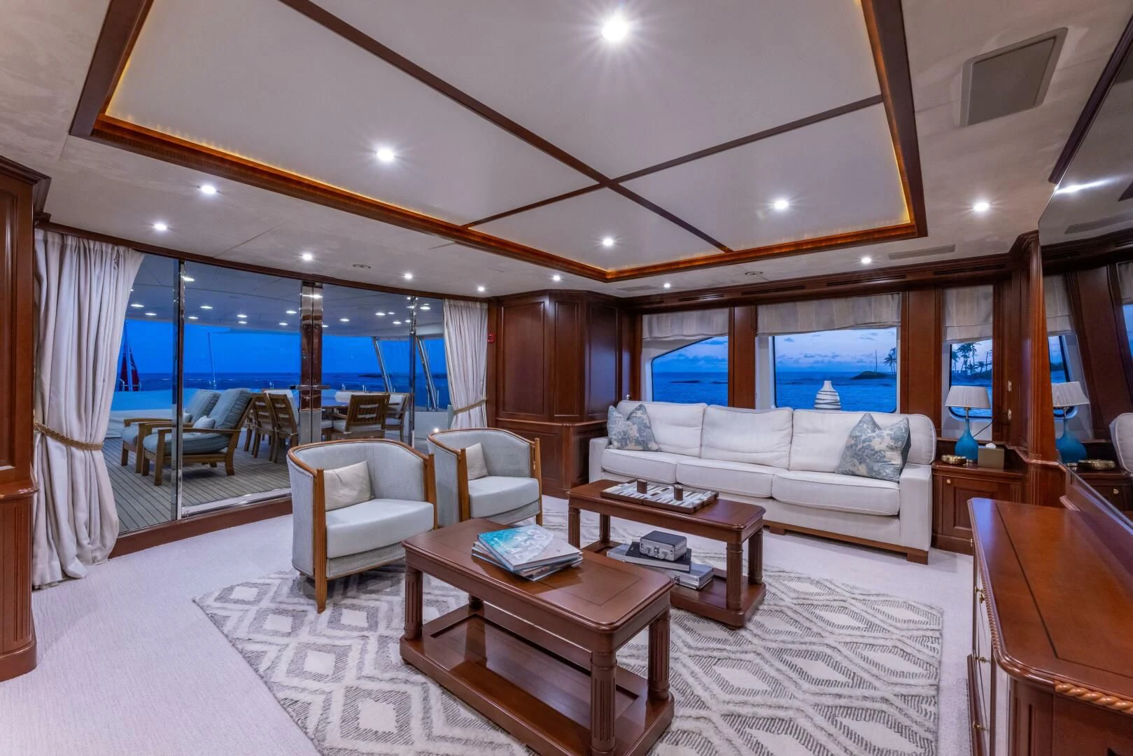 a living room with a large window aboard NAMASTE Yacht for Sale