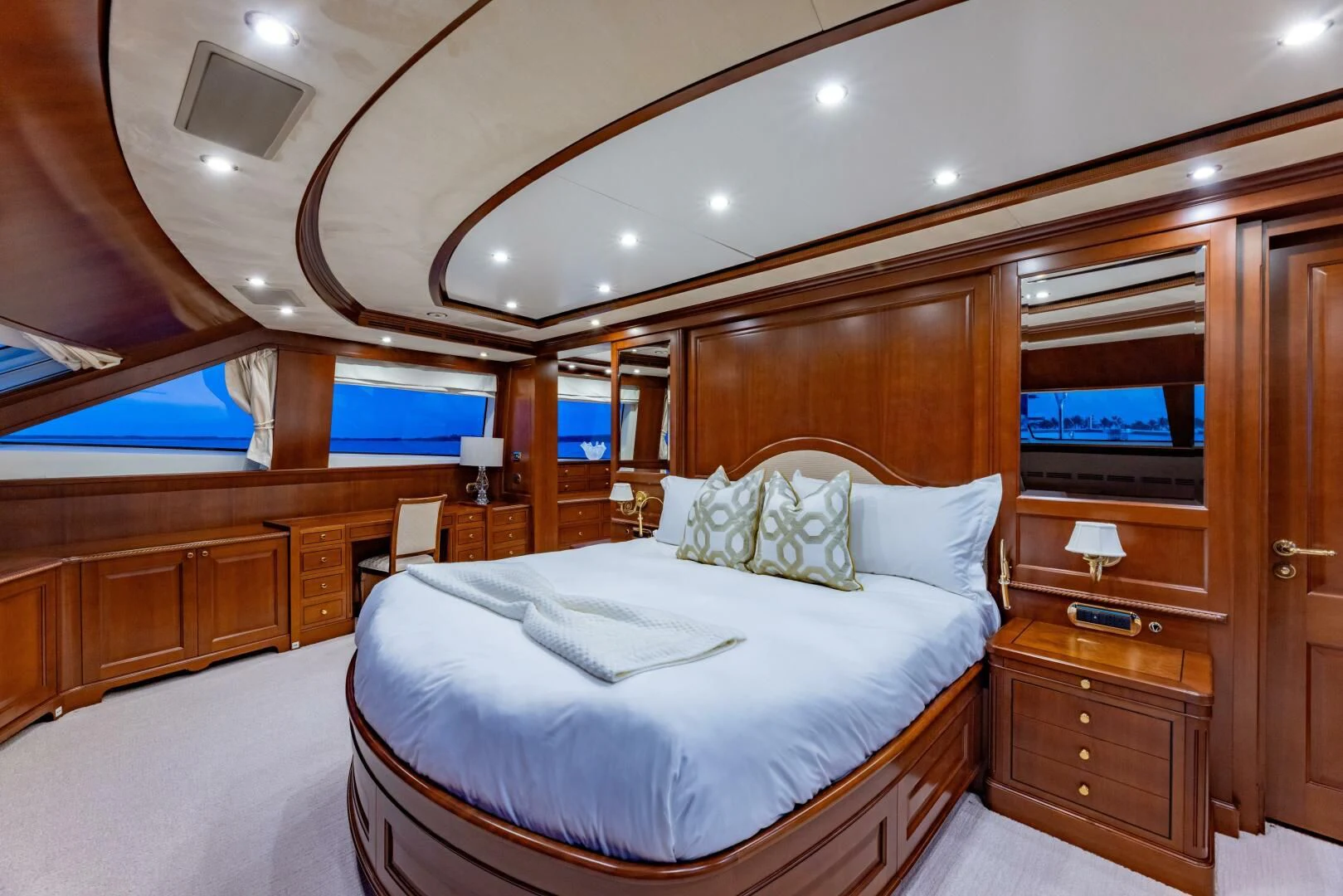a bed in a room aboard NAMASTE Yacht for Sale