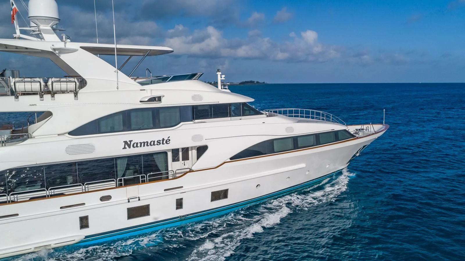 a white yacht in the water aboard NAMASTE Yacht for Sale