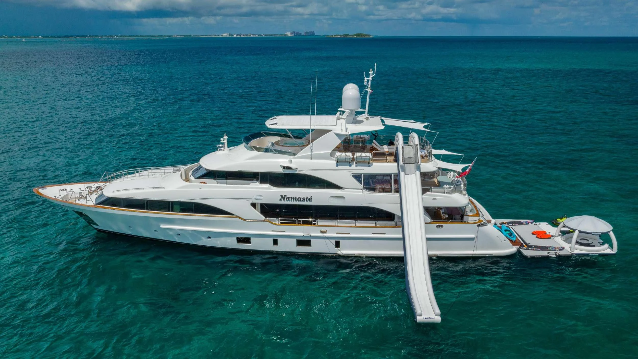 a white yacht in the ocean aboard NAMASTE Yacht for Sale