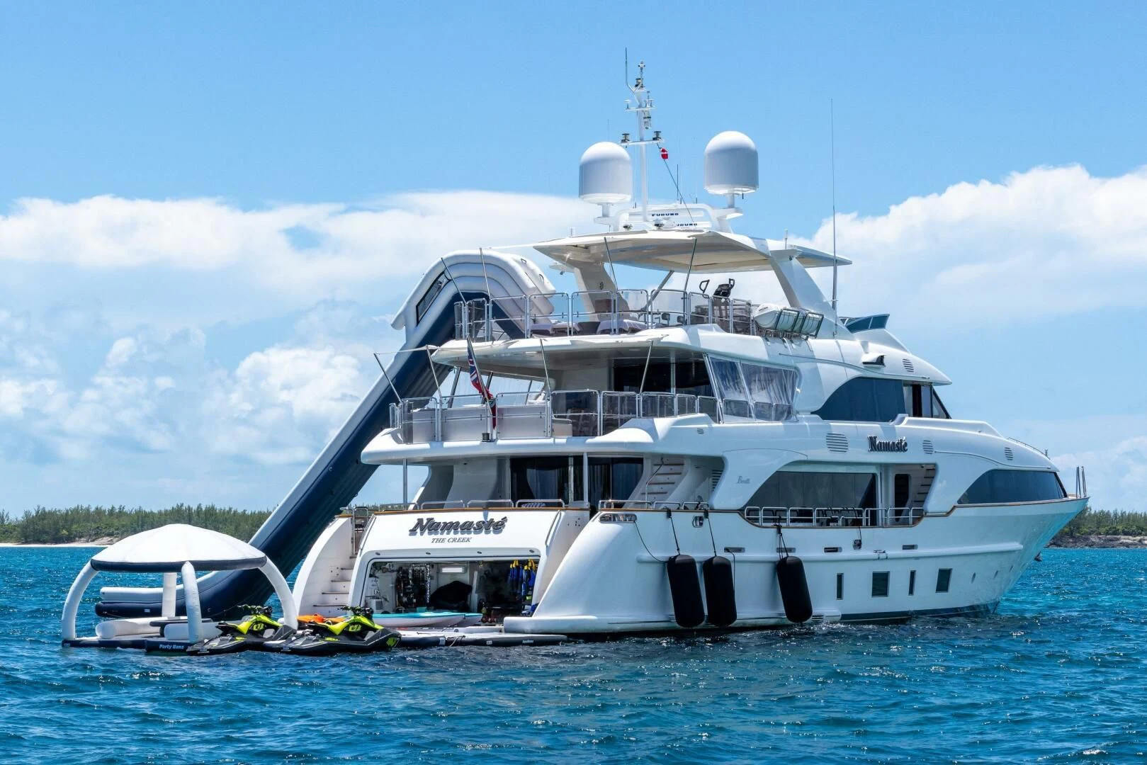 a large white boat in the water aboard NAMASTE Yacht for Sale