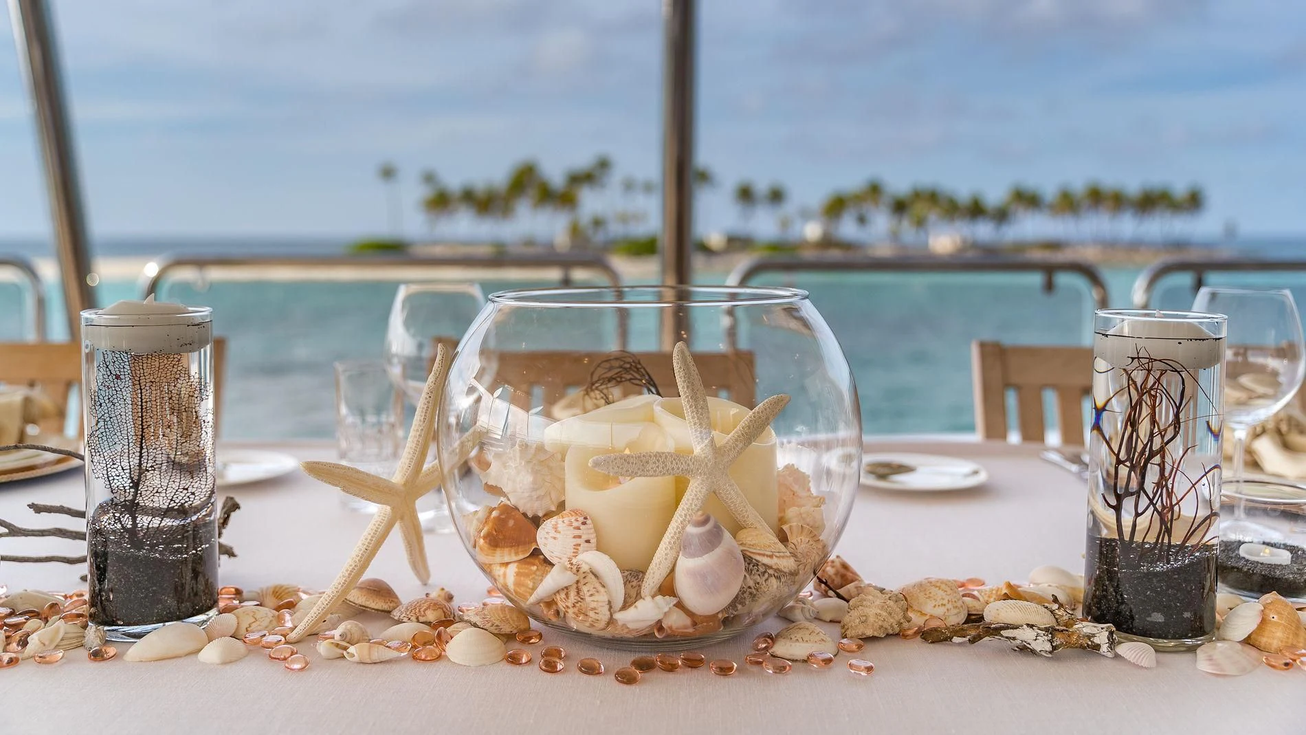 a table with food and glasses aboard NAMASTE Yacht for Sale