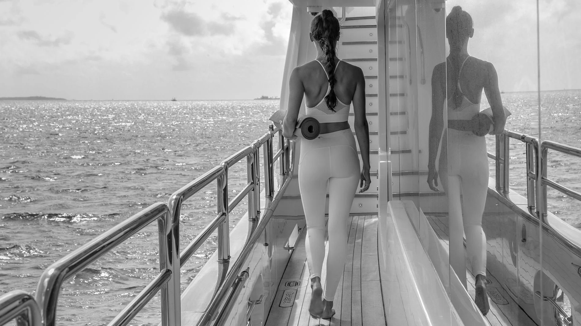 two women walking on a boat aboard NAMASTE Yacht for Sale