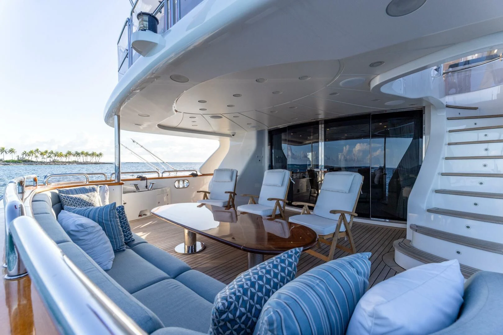 a boat with a table and chairs aboard NAMASTE Yacht for Sale