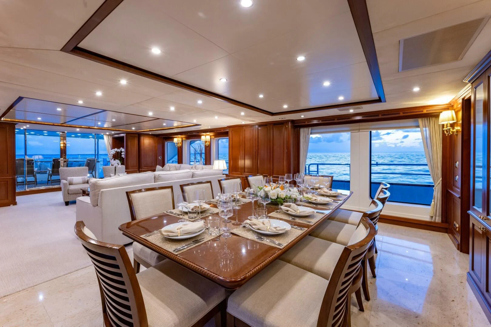 a dining room with a large table aboard NAMASTE Yacht for Sale