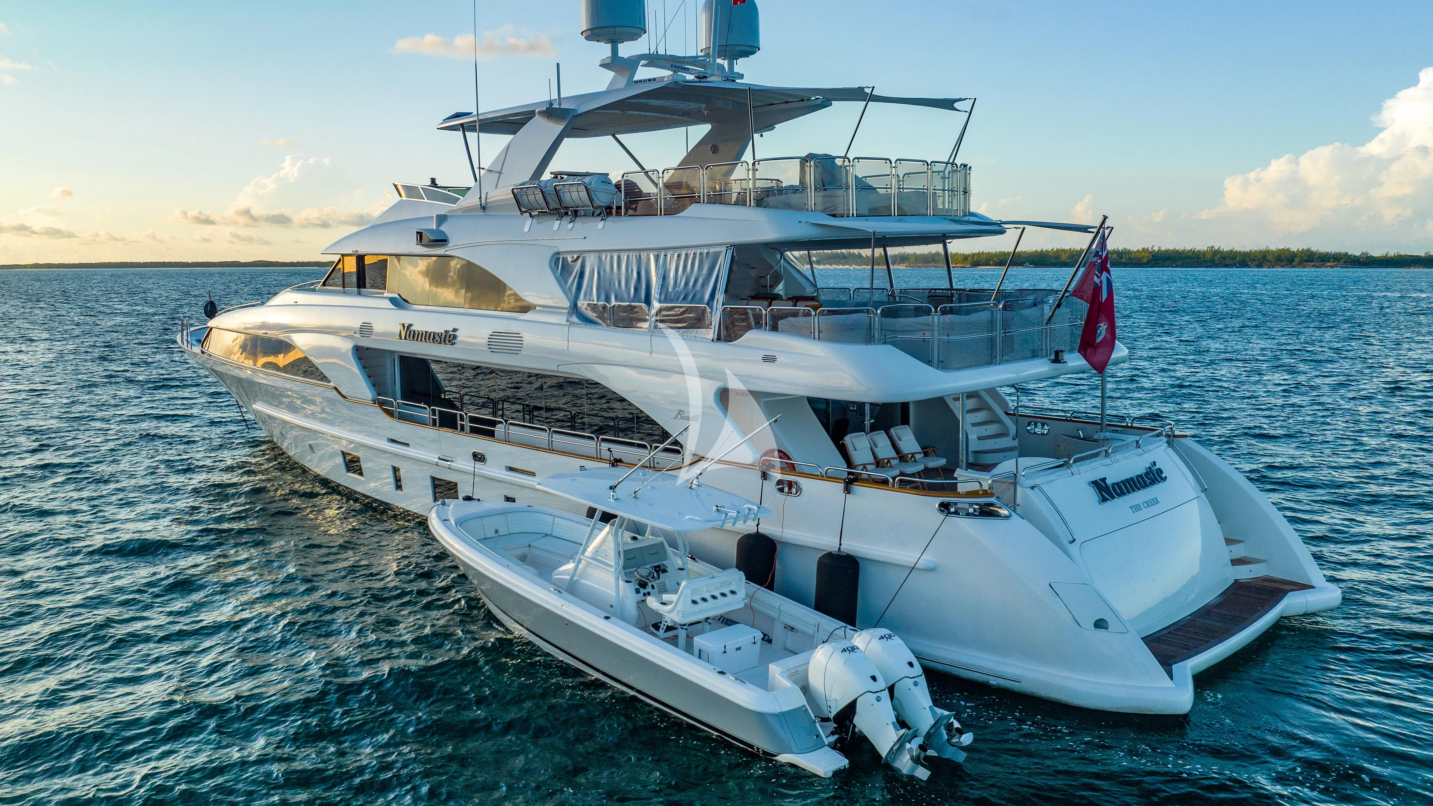 a large white boat in the water aboard NAMASTE Yacht for Sale