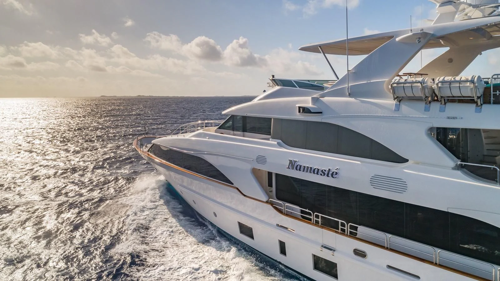 a boat on a beach aboard NAMASTE Yacht for Sale