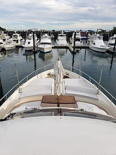 a boat is parked in a harbor aboard ALL RUMORS Yacht for Sale