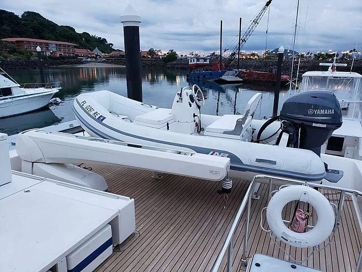 a deck with boats on it aboard ALL RUMORS Yacht for Sale